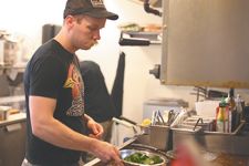 Rockne Roll/News-RegisterKyle Christensen is chef at The Diner.