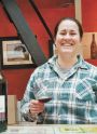 Marcus Larson/News-RegisterAmity Vineyards’ winemaker Darcy Pendergrass shows off a tempranillo and a dolcetto, the first wines under her own Tartan label.
