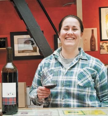 Marcus Larson/News-Register<br><b>Amity Vineyards’ winemaker Darcy Pendergrass shows off a tempranillo and a dolcetto, the first wines under her own Tartan label.</b>